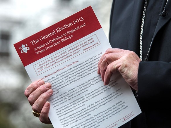 Cardinal-holds-up-the-Bishops-letter-on-the-General-Election